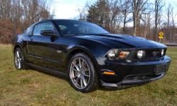 Stock #A8662. Beautiful Pre-Owned 2012 Ford Mustang GT 'Premium'!! 5.0L V8 Engine, 6-Sp Manual Transmission with 'HURST' Shifter!! Upgraded 'Flowmaster' Dual Exhaust, 19 Alloy Wheels, Power Driver's Seat, Shaker Audio System, Sync, Sirius Satellite Radio,