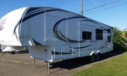 This like new 2012 Forest River Wildcat eXtraLite 312BHX 5th Wheel is in Excellent Condition, has been Smoke & Pet Free, and shoes have always been removed at the door. Used On About 15 Trips.
INTERIOR FEATURES: Vinyl Floors, Carpet, Cherry Wood Cabinet,