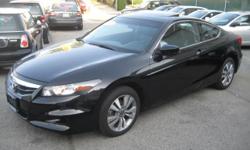 Royal Motors is happy to present this 2012 Honda Accord EX-L Coupe with Factory Warranty. We'll have you wishing your commute never ends! The rich Night Hawk Black Exterior and the Black Leather Interior finish gives this Honda a sleek and sophisticated