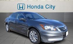 Look at this 2012 Honda Accord Sdn EX. It has an Automatic transmission and an I4 2.4L engine. This Accord Sdn has the following options: Pwr windows w/front auto-up/down, illuminated switches, Security system, 3-point seat belts in all seating positions