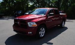 This Award-Winning Ram 1500 Express Crew 4x4 comes with HEMI power, dual exhaust, power windows & locks, 20' inch wheels, am/fm/cd with Sirius, room for 6, cruise and tilt, key less entry, privacy glass, trailer tow group & more! You always get the best