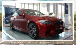 We priced this BMW M5 to sell quickly! You will find that is vehicle is loaded with options like: an Emergency Interior Trunk Release, an Auto-Dimming Rear-View Mirror, a Rear-View Camera, Active Knee Protection, a Dynamic Cruise Control, a Tire Pressure
