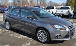 Stock #A9936. 2013 Ford Focus 'Titanium' Sedan!! Navigation System; Power Moonroof; Rear View Camera; 'Sony' Sound; Dual Climate Control; Heated Seats; Sync; Global 1-Touch Up/Down; Power Driver Seat; 17' Alloy Wheels; Heated/Signal Mirrors; and Keyless