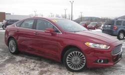 ***CLEAN VEHICLE HISTORY REPORT***, ***ONE OWNER***, and ***PRICE REDUCED***. Fusion Titanium, EcoBoost 2.0L I4 DGI DOHC Turbocharged VCT, 6-Speed Automatic, AWD, and Red. How would you like driving away in this good-looking 2013 Ford Fusion at a price