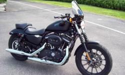 JUST LIKE NEW, WITH A FEW EXRAS. You get a custom windshield, a 2 passenger seat, with passenger pegs, and the factory warranty is good to May 5, 2015!!
The 2013 Harley-DavidsonÂ® SportsterÂ® Iron 833? model XL883N is an amazing way to get started with a