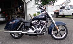 2013 Harley Davidson FLD Switchback. Big Blue Pearl. 606 miles. Purchased new in December 2012 but I didn't take delivery and 2 year warranty did not start until April 2013. Balance of warranty goes with bike.
Detachable factory hard bags & windshield.
