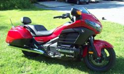 THIS BIKE LOOKS LIKE IT JUST LEFT THE FACTORY!
2013 Honda Gold Wing F6B Deluxe. A New Way To Go Everywhere.Honda's new Gold Wing F6B takes the world's greatest touring motorcycle--our own Gold Wing--and puts a whole new spin on it. Lighter, trimmer,