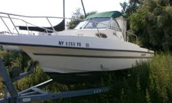 Mercruiser 3.0L I/O, 135hp. Walkaround cabin fishing boat w/ very little time on it. Sleeps 2, space for porta-potty. Full canvas enclosure. Nice simple, easy to operate, economical fishing machine package. Electronics include, Standard Horizon GPS Chart