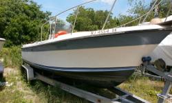 1998 Yamaha Saltwater Series II V225 OX66 EFI. A fine example of an older quality center console, with well thought out seating, small cuddy cabin for dry storage and an occasional overnight. Great performance when used as a sport fisherman. Call Brad
