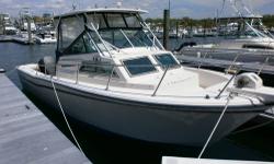 With Twin Suzuki 200 hp (one new last year). Our service customer is looking to upgrade. Full canvas enclosure extends your fishing season. LOA 25' 4", Beam 9' 6", Wt 5130, Draft 1' 7", Bridge Clearance 9' 10", Deadrise: 20 Â° at Transom. Full guages, Gps,