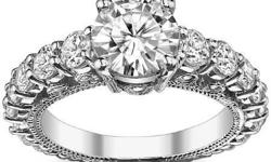 Beautifully styled, our 2.05 ct.tw Oval Shape Diamond Engagement Ring features an extravagant 1.05 ct carat oval cut diamond center, accompanied by 1.00 ct.tw side stones. All diamonds are hand-selected to match in color, size and quality. They are rated