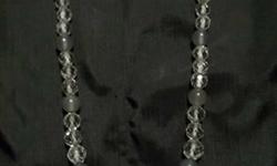 2 Crystal Glass Bead Necklaces. One in Gray and White. $15.
The other is a gold / pink, kinda a champagne color and white with little bands in between the beads. $20
If you buy both I will sell them for $30.
I have a CASH Only, NO returns, NO refunds,