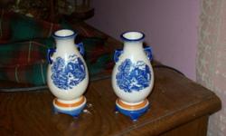 2 vases 4 1/2 inches high Marked Occupied Japan..