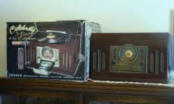 3-in-1 Entertainment Center with turntable for records, cassette player and AM/FM radio. This piece looks like an old-time radio. See the photo. The original box is included.