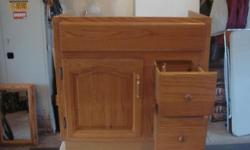 For Sale 30" Oak Vanity with Vanity top, Polished Brass Faucets and drain, also a matching 4 shelf double door Medicine cabinet. These items are in better than good condition and just show normal wear . They were all taken great care of and were bought