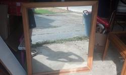 This mirror is in good shape. Wood has a rough spot on the bottom as shown in one of the pictures. Its 33.5 inches wide and 38 inches long. The glass has no chips in it and is in good shape. Looking to get $10 OBO. Text or email. 716 seven85 - 0nine20