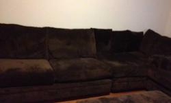 Pick up only. Couch is supposed to be in the shape of a "U" around ottoman but it did not fit in my living room as is so I had to adjust it differently. Pillows are included. Check out the original picture here http://www.mybobs.com/charisma