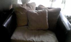 Brown leather and tan microfiber sofa loveseat and chair. Cleaned and maintained very well. Three piece glass top coffee table set for $100. Also a Flat Screen TV stand that holds plenty of DVDs for $75.