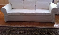 White slipcovered sofa, loveseat and ottoman. Gently used and in "like new" condition. Set is less than 3 years old and was purchased new from Ikea for $1,000.00. Owned by non-smokers with no pets. $400, cash only.