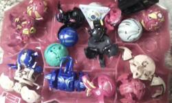 40 small bakugan 2 large /2 cases and stack of cards 100.