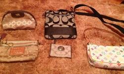 A white Louis Vuitton bag, a real coach satchel, a real coach makeup bag, and a real coach wristlet. Contact me regarding prices!