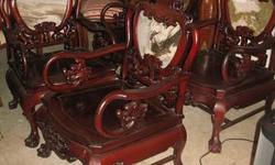 This auction is for a set of four vintage chairs, solid wood, finish is red, I think they are mahogany but do not know, backs are intricately carved and have a natural veined white marble inset, deeply carved with Chinese dragons and Oriental motif, all