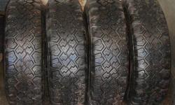 This is a set of four Wintermark brand studded 235x75x15 snow tires mounted on 5x5 1/2 bolt pattern steel wheels that will fit Dodge or Ford. The tires have less than 1000 miles use and the tread is good. The wheels have surface rust but are in good