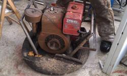 Around 4000 watt. Powered by an 8hp briggs and stratton. Runs great! Ready to work or restore. Does not smoke. Rope start.