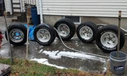 5 15in chevrolet 5-lug bolt pattern rims, 4 alloy 1 steel.
2-275/60 R15 with practically brand new rubber
2 235/60 R15 with slightly worn rubber
1 205/70 R15 with really new rubber steel rim
$100 for each alloy
$50 for the steel rim