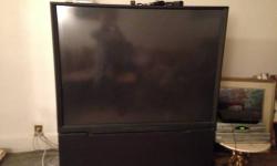 60" Hitachi large screen TV (projection style). Item is in perfect working order. I have to sell because I am moving to a smaller place. It is heavy but does have wheels. ***** $300 or best offer *****
