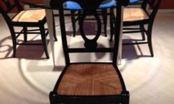 Black dining chairs with woven rush seats - in great condition!