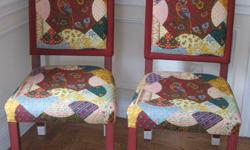 This is for 6 upholstered dining chairs with patchwork looking fabric surrounding a center bird motif. (I only show 2 - all 6 are the same.) They were slip-covered in white which was removed, but the white fabric near the feet was left and comes off