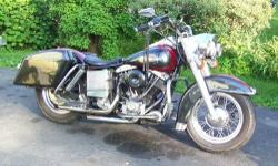77 Harley Davidson electra glide 74ci(1200cc) has upgraded cams
A S&S superE carb custom 2 tone paint pearl red/Harley pearl black , hard bags a lepera alligator tooled solo seat and a gel 2up seat with passenger back rest this is my daily rider runs n