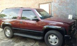 98 Tahoe 2 door with new 2002 cadillac engine with 500 miles truck has *headers *transmission shift kit *double exhaust * new carpet *steel roll pan bumper and Custom Black Leather Interior I put alot of work and customizing stuff must see to believe