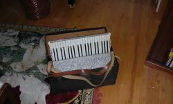-full size Wurlitzer accordian, 120 bass, mother-of-pearl finish, very good condition, $550.
-Wurlitzer miniature, 2 octave keyboard, good condition. $250
Both for sale at $650. private party.