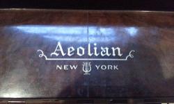 Aeolian upright piano, it was last tuned less than a year ago. This piano sounds great and it's in good condition. It also includes a bench. Price is firm and this item must be picked up.