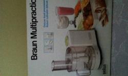 Braun food processor -- It is a brand new and has never been used ( includes instruction and registration booklets) , can chop,whip,and blend, bowl holds 4 cups/ 1000ml for liquids ( with the blade inserted into the bowl ) 3 1/3 cups (500g of flour) and