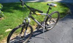 riding only twice, this mountain bike is light and almost brand new, 10 speed bike, green color, for ladies.