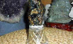 Exceptional Amber Fossil Crystal Dark Golden Brown on a Glass Base and actually has tree imbedded thru out the Amber on a Glass Base. This is a Beautiful piece of Amber. Origin: Indonesia. Amber-Mystical properties from ancient times. Said to help with