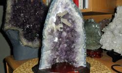 Amethyst with Calcite Geode Cathedral Dark Purple Gem Grade. The only area of the world to find Amethyst filled geodes with such stunning form and beauty is Rio Grande do Sul, Brazil. This is a gorgeous geode which contains pointed calcite crystals