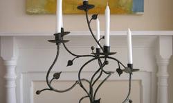 ANTIQUE TABLETOP RUSTIC CANDLE HOLDER -- This beautiful hand forged wrought iron candelabra, over 100 years old, brings elegance to any indoor or garden candlelight experience. Shown with six 7" tapered candles.
All collectors will appreciate the
