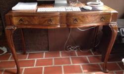 Delicate wooden desk with leather top, two drawers. Inside drawer reads "Hathaway's 51 West 45th Street New York". Probably 1940s. Pick up in Pelham,Westchester County, NY. In good shape; joinery on left side a bit loose.