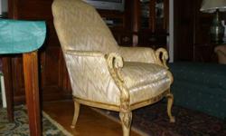 ANTIQUE CARVED SWAN HEAD ARM CHAIR - DOWN FILLED CUSHION
Two graceful carved swans adorn the front cabriole style legs. Solid wood frame with creamy ivory painted finish is original. REUPHOLSTERED with very fine flame stitch pattern fabric in sunny tones.