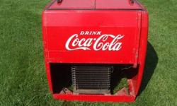 For Sale: This Vintage Coke machine was made by Westinghouse for Coca-Cola in the Mid 30?s & 40?s, with the flip top doors, The unit was working when I put it into storage. Everything is there the compressor, electric fan and the radiator. $400.00 or