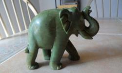 Antique Elephant Light Green Jade Statue-This Exceptional Antique, Beautiful Light Green Multi color Jade Elephant carving, comes from India. The label is still on the statue. This Antique would make a great item to add to your collection, especially if