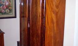I purchased this beautiful flame mahogany wardrobe in Yorkshire England at an estate auction. I have used it for 20 years - in England, Maryland, and New York. Now we no longer have the room. It is in excellent condition, there are f few small veneer