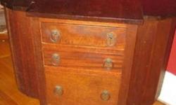 I believe this is an early 20th century sewing cabinet. In great shape except for small damage to hinge. Cabinet easily used as decorative piece, unique end table, night stand, and of course as a sewing cabinet!
Approx dimensions are: 29" tall x 26" wide