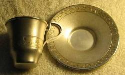 Antique silver filled Russian coffee cup/ saucer: nickel/ silver alloy (70/30), with 24k gold plated inside of cup.
H of cup- 2 1/8", diameter of saucer- 3 5/8".
NEVER WAS USED.
It was cleaned by soda and now looks like new and ready for a GIFT.