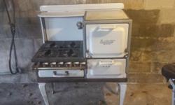 Estate Fresh Air Antique stove/oven.
Good condition, could still be used or just for decoration. Paid $1650 make offers.