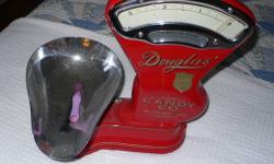 Perfect, restored, Toledo Dayton Candy Co. Scale. Triple chrome plated scoop and face plate, lovely dark red paint with gold pin striping, adjustable feet and built in level.
You will not find one like this!! Offers accepted!